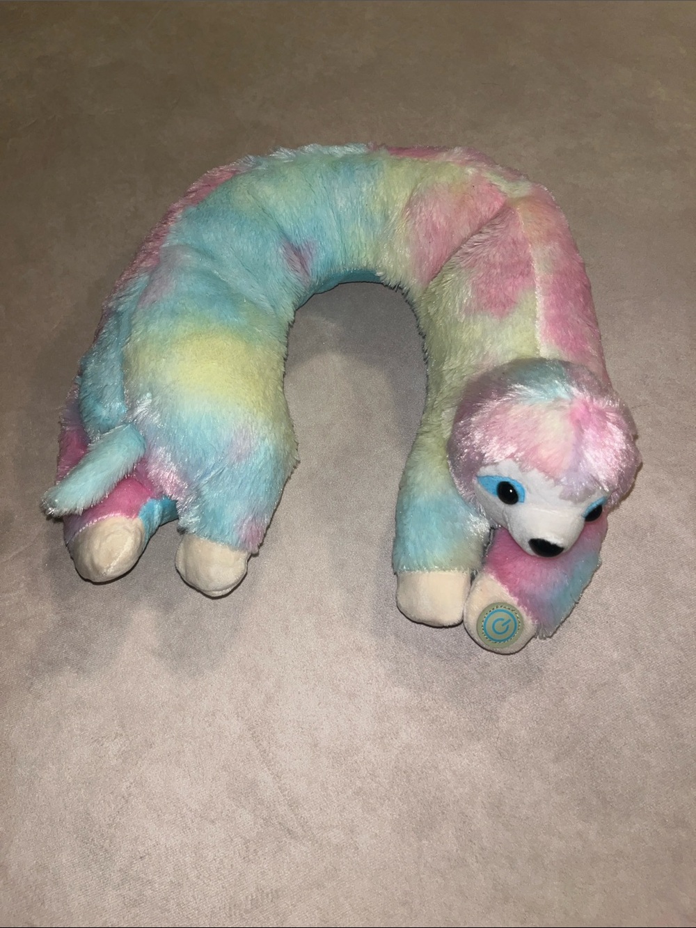 Health Touch U-shaped rainbow sloth plush neck massager